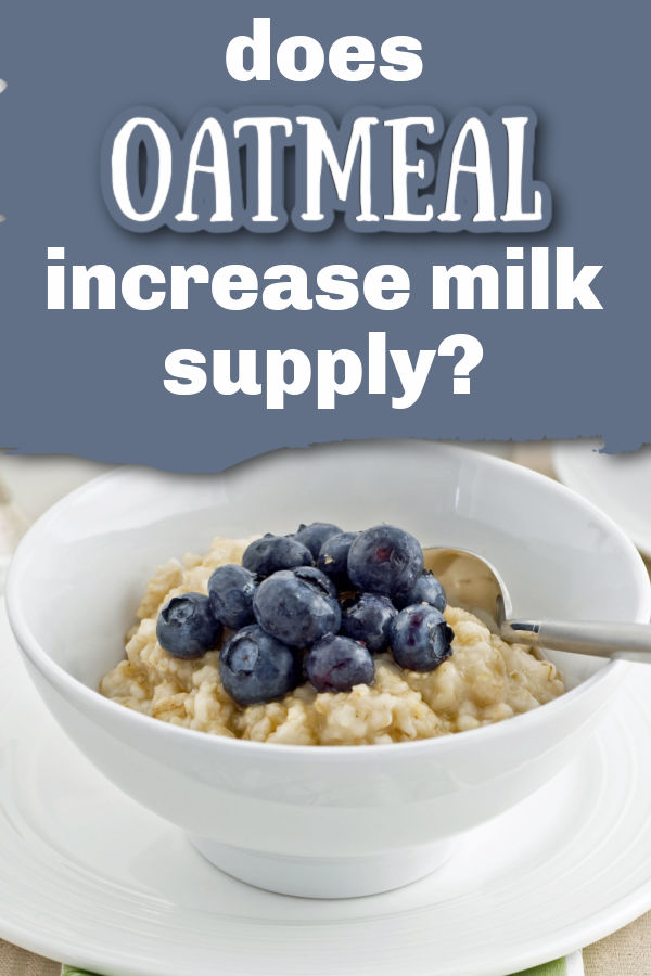 blueberries on top of oatmeal in a white bowl with a spoon with text overlay Does Oatmeal increase milk supply?