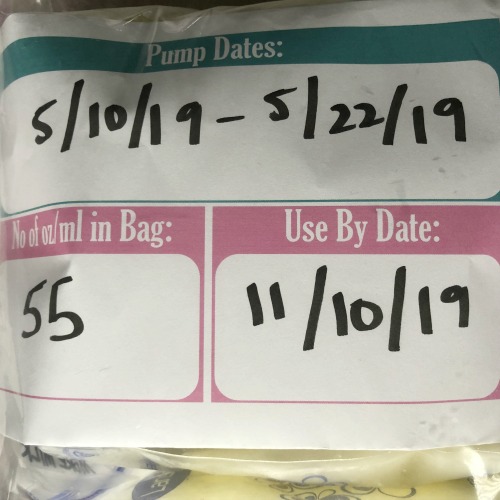 Frozen Breastmilk labeled with a printable indicating pump dates 5/10/19-5/22/19, 55 oz in the bag, and use by date of 11/10/19