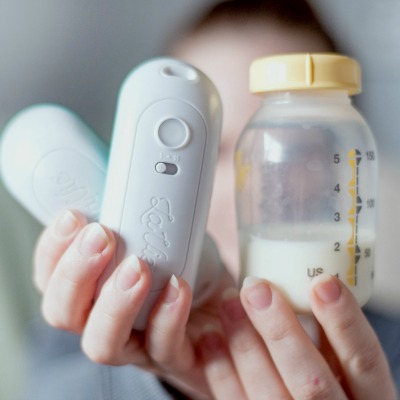 Lavie Warming Massager and a Bottle of Breastmilk