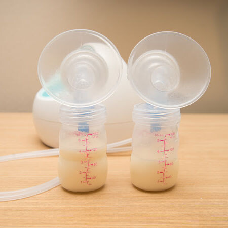 spectra breast pump on a table