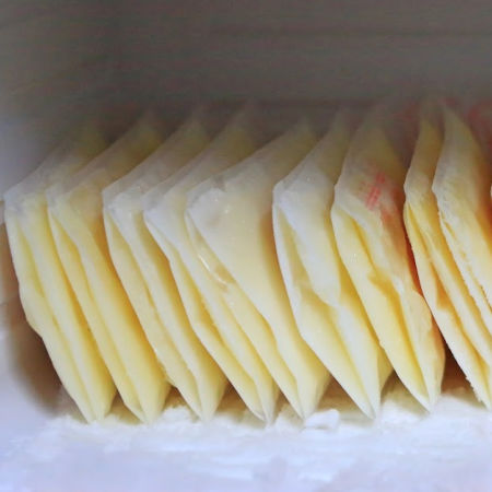 frozen breast milk in freezer