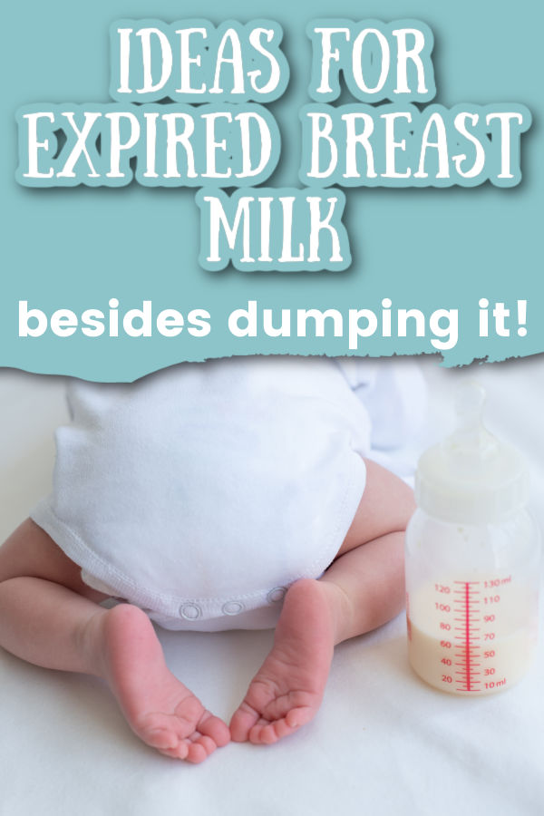 Baby wearing white onesie with half full bottle of breast milk