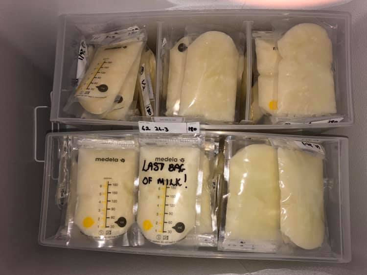 deep freezer containing frozen breast milk bags 
