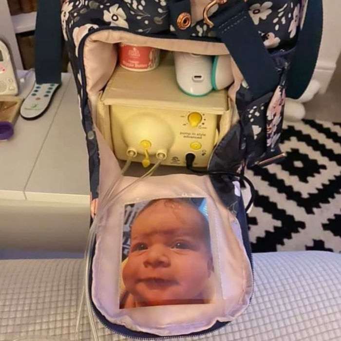breast pump bag with a picture of baby on the flap