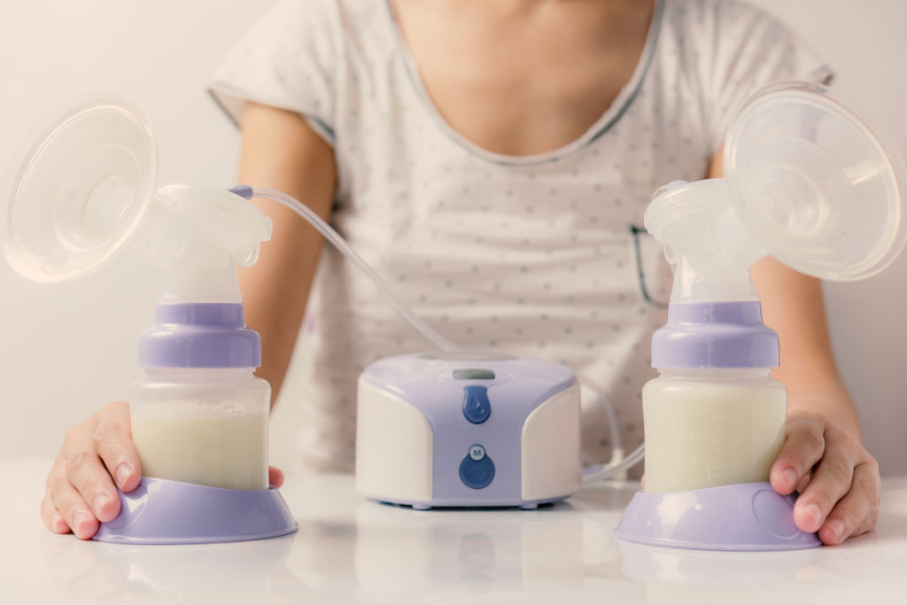 woman with breast pump