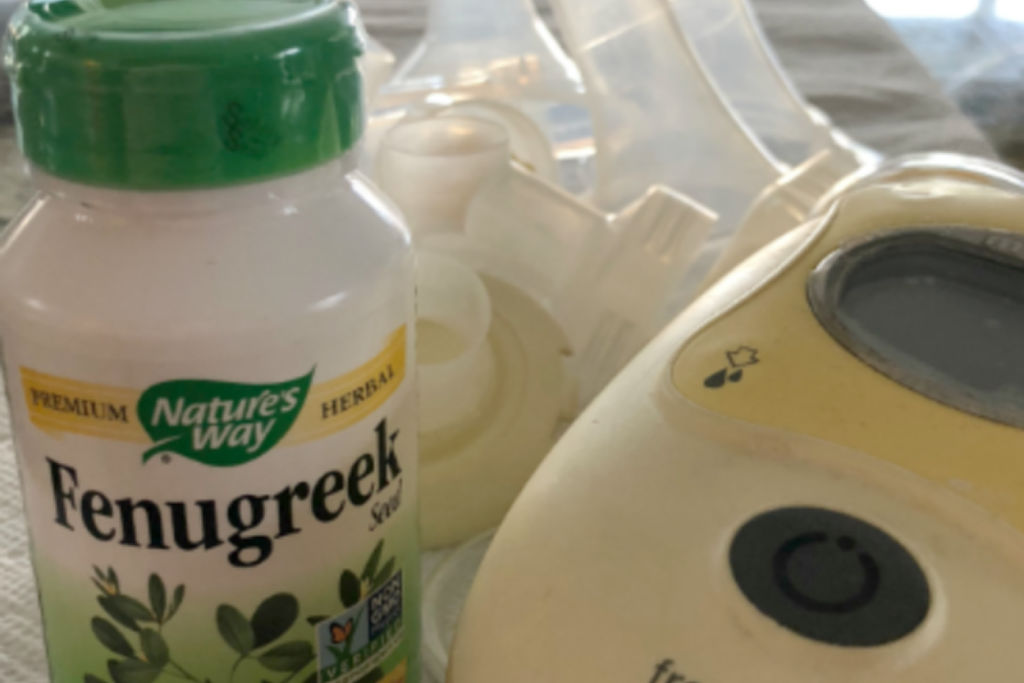 bottle of fenugreek with a breast pump and pump parts