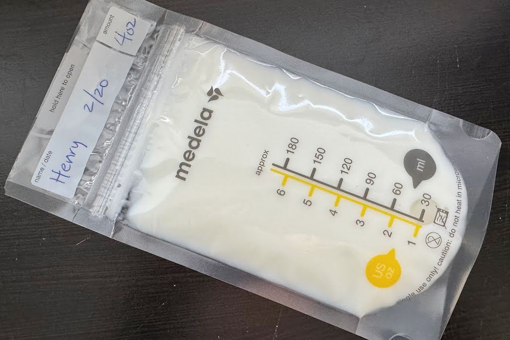 labeled medela breast milk bag with milk in it